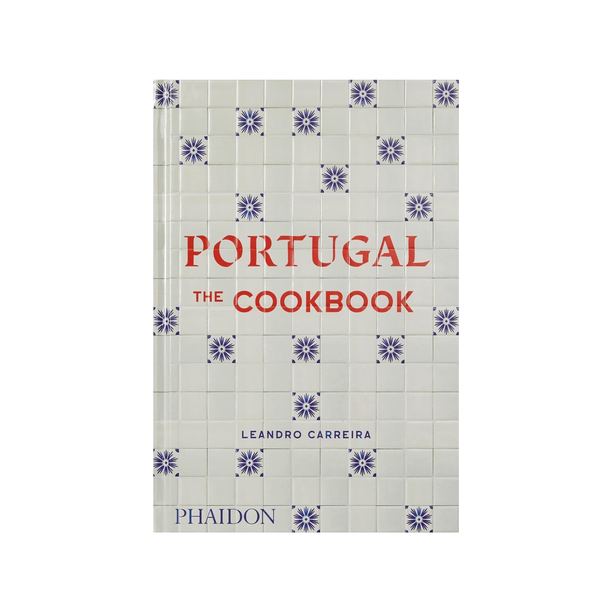 Calimia Home Portugal: The Cookbook featuring a white tile pattern cover with blue floral motifs and red lettering.