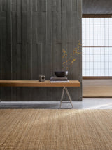 Armadillo Reed Rug in Natural, a second view of the handwoven jute flatweave rug in a styled interior