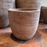 Ribbed terracotta egg planter — side view