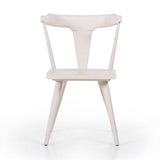 Calimia Home Ripley dining chair in a white wood finish with a sculptural mid-century modern silhouette.