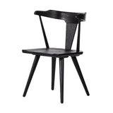 Calimia Home Ripley dining chair in black oak with a sculptural mid-century Windsor-inspired bowed silhouette.