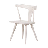 Calimia Home Ripley dining chair in white solid wood with a sculptural mid-century inspired silhouette and tapered legs.
