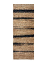 Armadillo River Nook Rug in Natural & Indigo, overhead view of the handwoven jute weave and edge finish