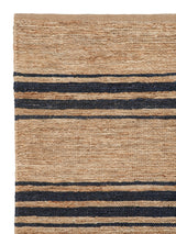 Armadillo River Nook Rug in Natural & Indigo, corner close-up of the jute pile and edge