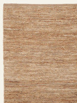 Armadillo River Rug in Natural, corner close-up of the jute pile and edge