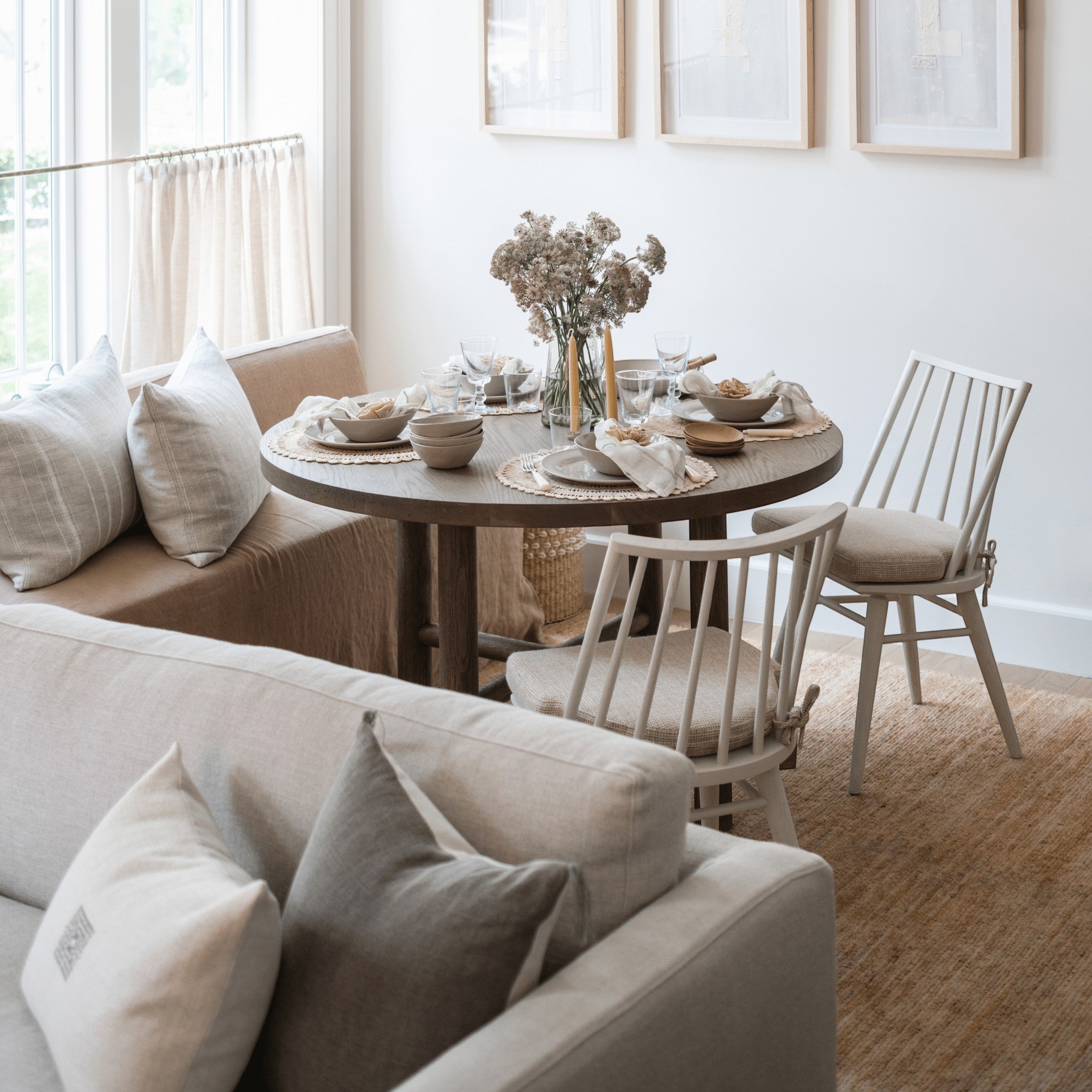 Calimia Home River Rug with rippled texture in a neutral dining room setting with wooden furniture