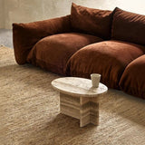 Calimia Home River Rug, a handwoven natural jute area rug with a rippled texture in a living room setting.