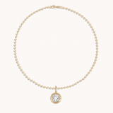 Close-up view of ball chain showing bezel-set crystal details