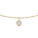 Round bezel rolo chain necklace in yellow gold on white background