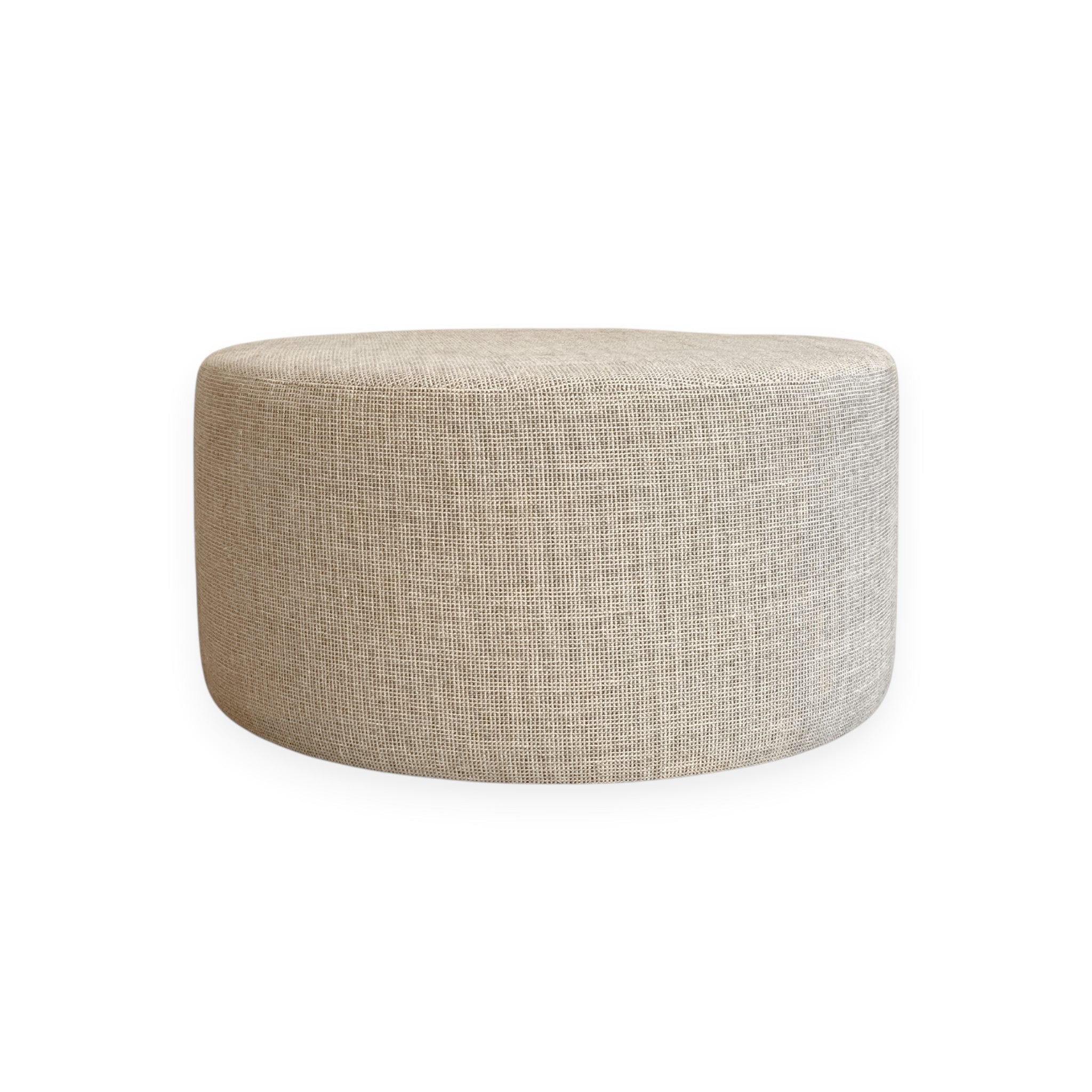 Calimia Home round ottoman upholstered in textured beige Belgian linen with a minimalist silhouette.