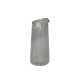 Be Home Ruffle Glass Lines Carafe with a clear, ribbed texture and elegant scalloped rim for serving drinks.