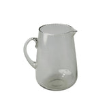 Be Home clear glass pitcher with a delicate ruffled rim and curved handle for elegant beverage serving