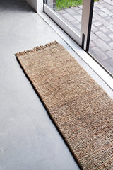Armadillo Sahara Nook Rug in Natural, a second view of the double-woven jute rug in a styled interior