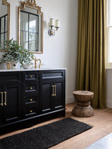 Armadillo Sahara Nook Rug in Charcoal, a second view of the double-woven jute rug in a styled interior