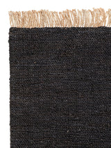 Armadillo Sahara Nook Rug in Charcoal, corner close-up of the jute pile and edge