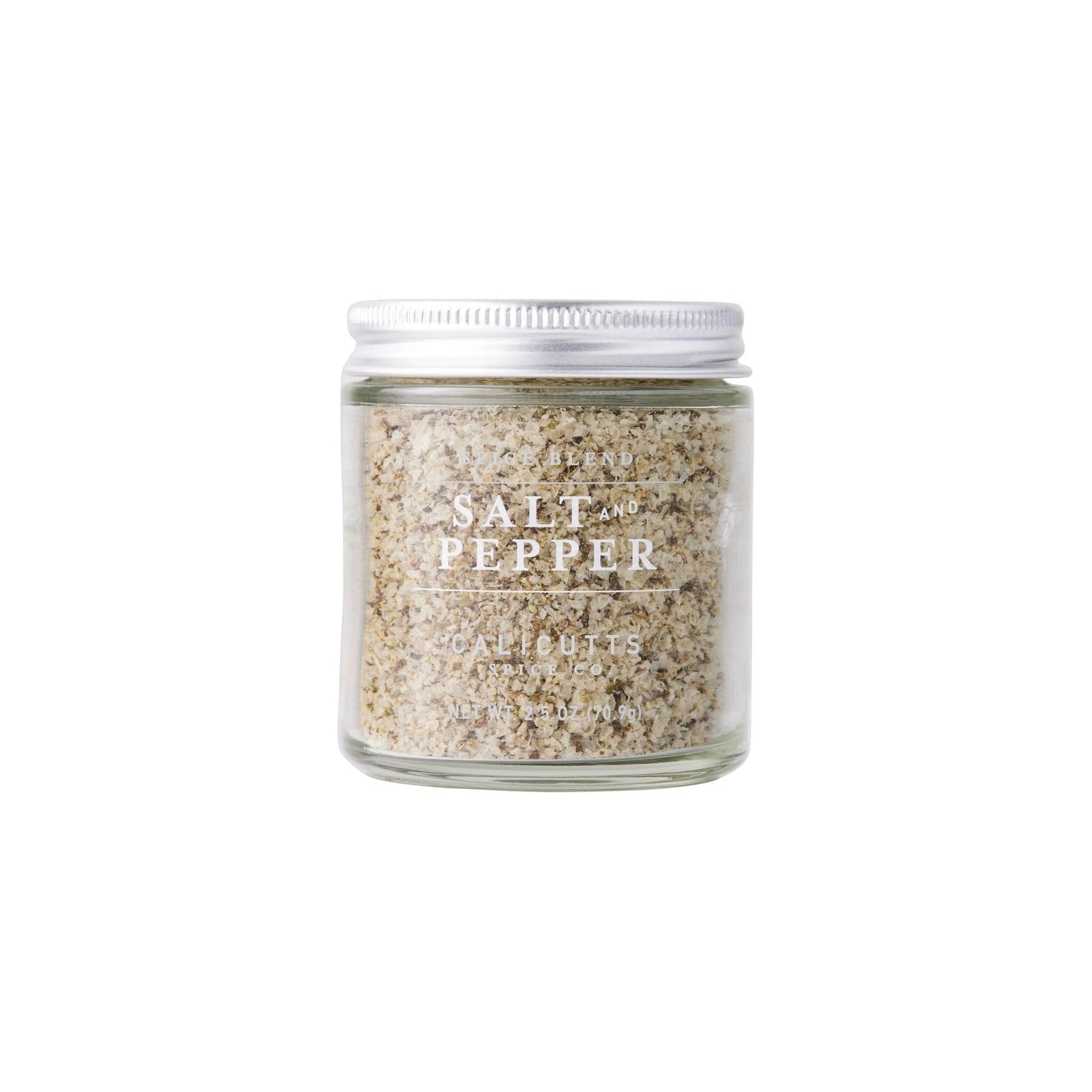 Calicutts salt and pepper spice blend in a clear glass jar with a silver lid on a white background
