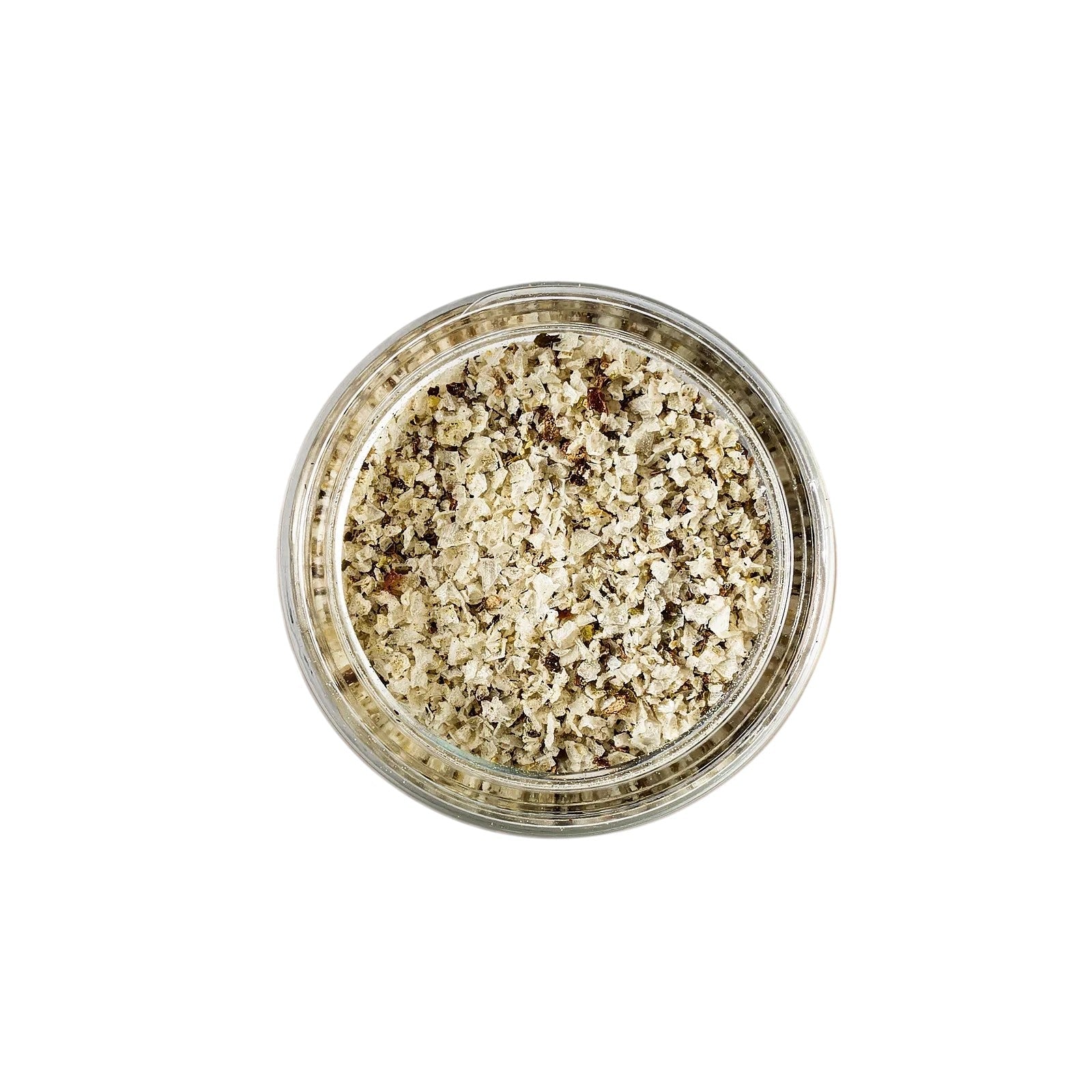 Calimia Home salt and pepper spice blend in a glass jar, featuring coarse sea salt and cracked black pepper.