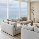 Sander Tan Pillow styled on a sofa — natural linen texture and warm tan tone in a living room setting