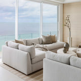 Sander Tan Pillow styled on a sofa — natural linen texture and warm tan tone in a living room setting