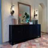 Santa Barbara mirror in natural rattan — styled view
