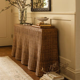 Calimia Home Scallop Console table in chestnut rattan with a handwoven scalloped edge design in a living room setting.