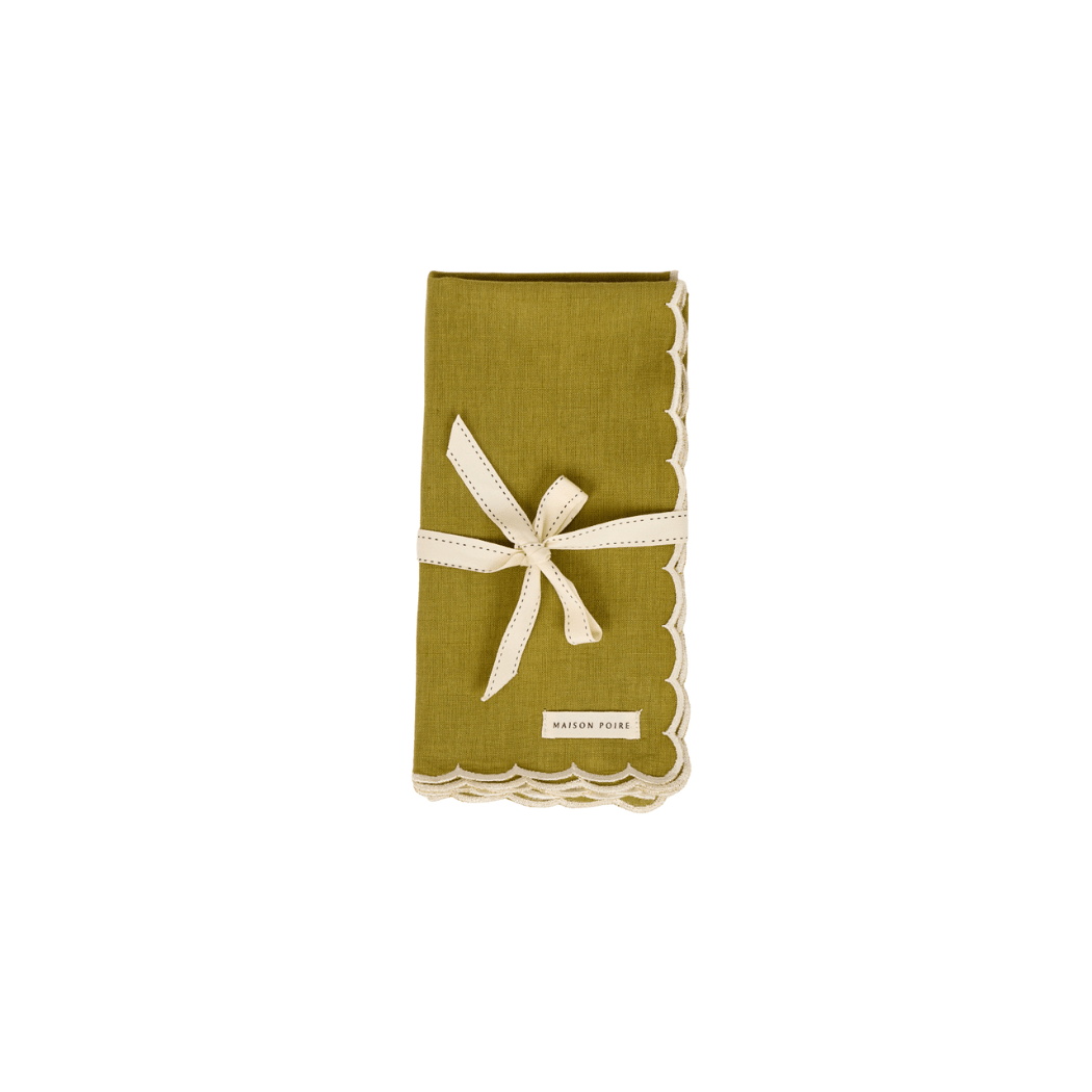 Maison Poire olive cotton linen napkin with an ivory scalloped edge, folded and tied with ribbon