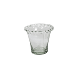 Detail of scalloped edge on clear glass vase