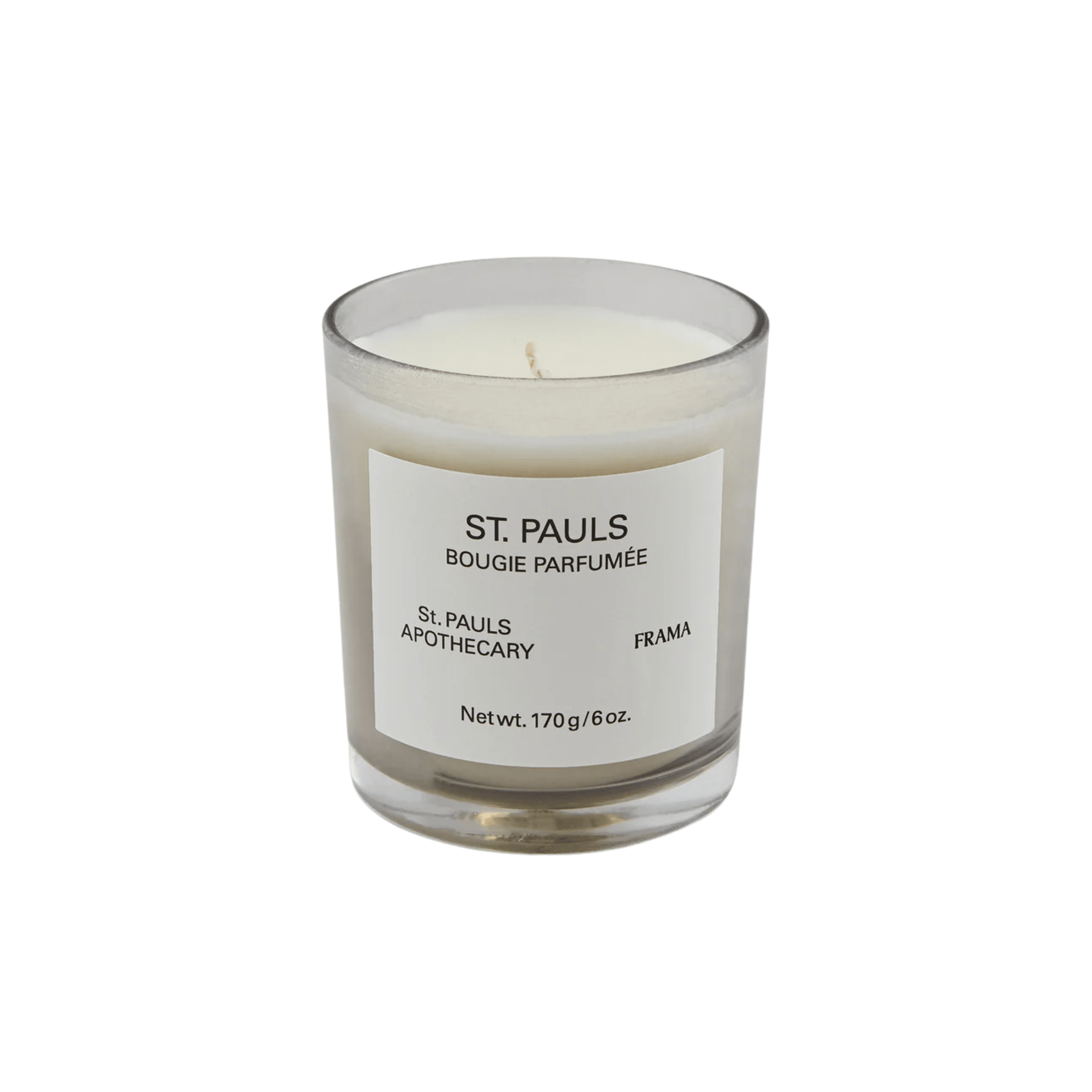 The 170g/6oz Scented Candle - St. Pauls from the Apothecary Collection comes in a clear glass jar with a white label and delivers FRAMA’s signature fragrance, ST. PAULS BOUGIE PARFUMÉE, to enhance any space.