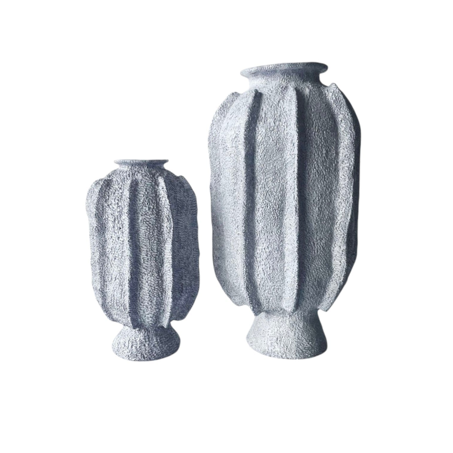 Calimia Home Sea Garden Prehistoire hand-formed terra-cotta vases with white glaze and organic coral-like texture.
