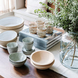 Be Home Seagrass Cage Tumbler set with clear glass and removable handwoven natural seagrass wrap on a table