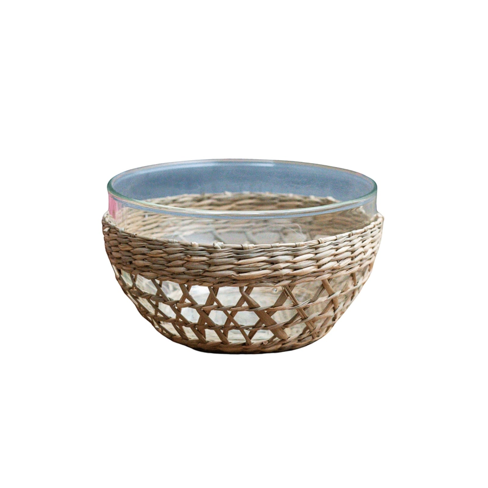 Be Home low bowl featuring a clear glass insert wrapped in a decorative handwoven natural seagrass cage design.