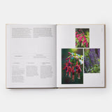 Calimia Home The Seasonal Gardener book open to a spread showing a fuchsia and salvia planting combination.