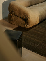 Armadillo Selva Rug in Walnut, detail of the afghan wool weave and texture