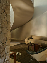 Armadillo Selva Rug in Walnut, handwoven afghan wool kilim rug shown in a room setting