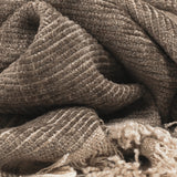 Calimia Home Serra Throw in mink brown, hand-woven from soft chenille yarn with a textured ribbed finish.