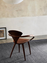 Armadillo Sherpa Rug in Charcoal, a second view of the handwoven wool blend rug in a styled interior