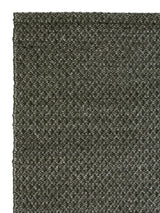 Armadillo Sherpa Rug in Kelp, corner close-up of the wool and viscose blend pile and edge