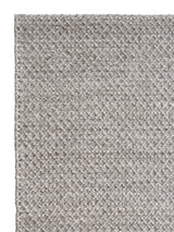 Armadillo Sherpa Rug in Pumice, corner close-up of the wool and viscose blend pile and edge