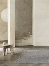 Armadillo Sherpa Rug in Pumice, handwoven wool blend rug shown in a room setting