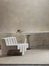 Armadillo Sherpa Rug in Sand, handwoven wool blend rug shown in a room setting