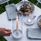 Silo Taper Hurricane with lit taper candle on table, Farmhouse Pottery