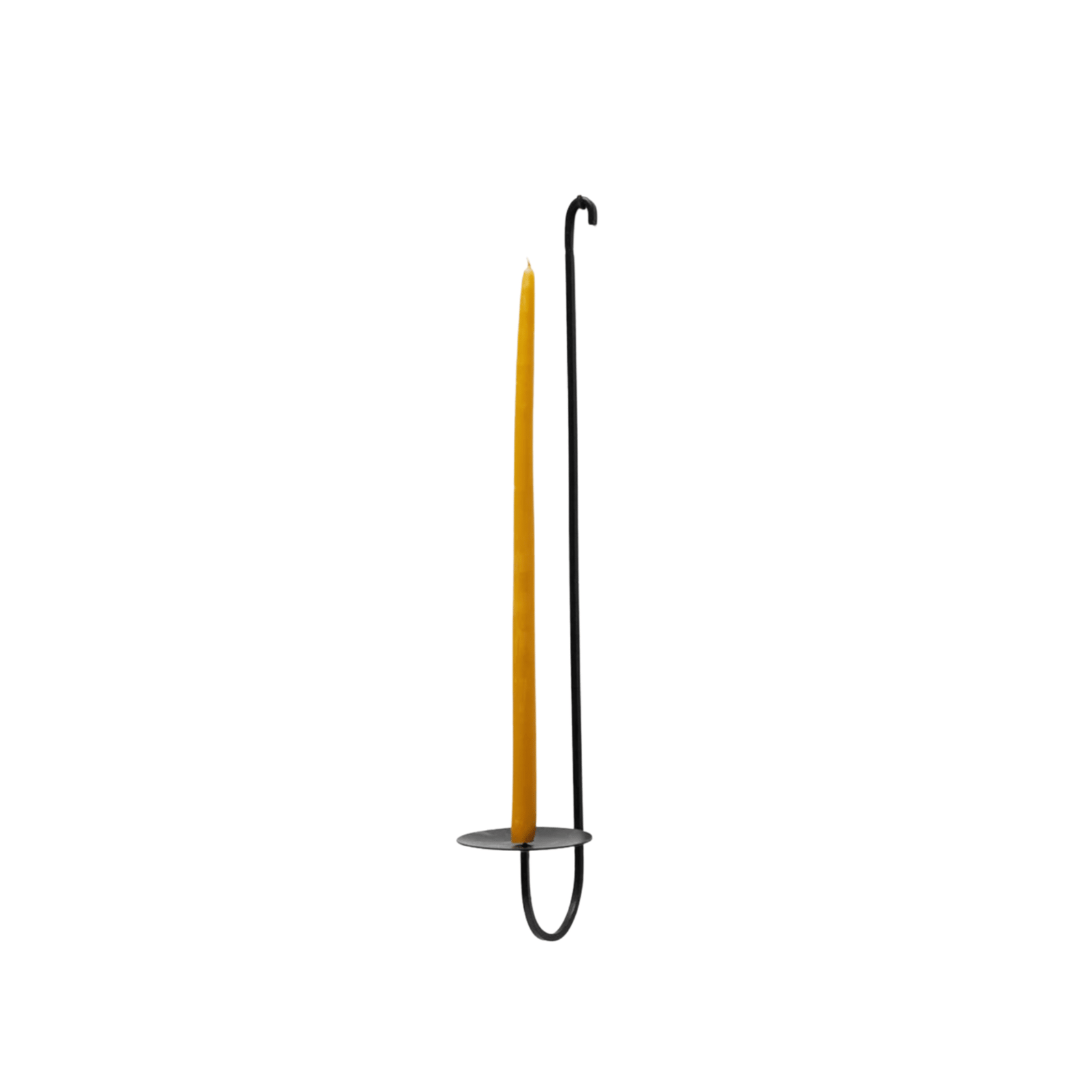 Iron wall candle holder with a yellow candle on a white background