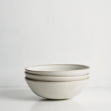 Small bowl side view showing curved silhouette and glaze detail
