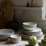 Standard Affair dinnerware collection in oat on dining table