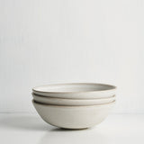 Small bowl side view showing curved silhouette and glaze detail