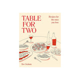 Calimia Home Table for Two cookbook by Bre Graham featuring a cream cover with red line art of a dinner table setting