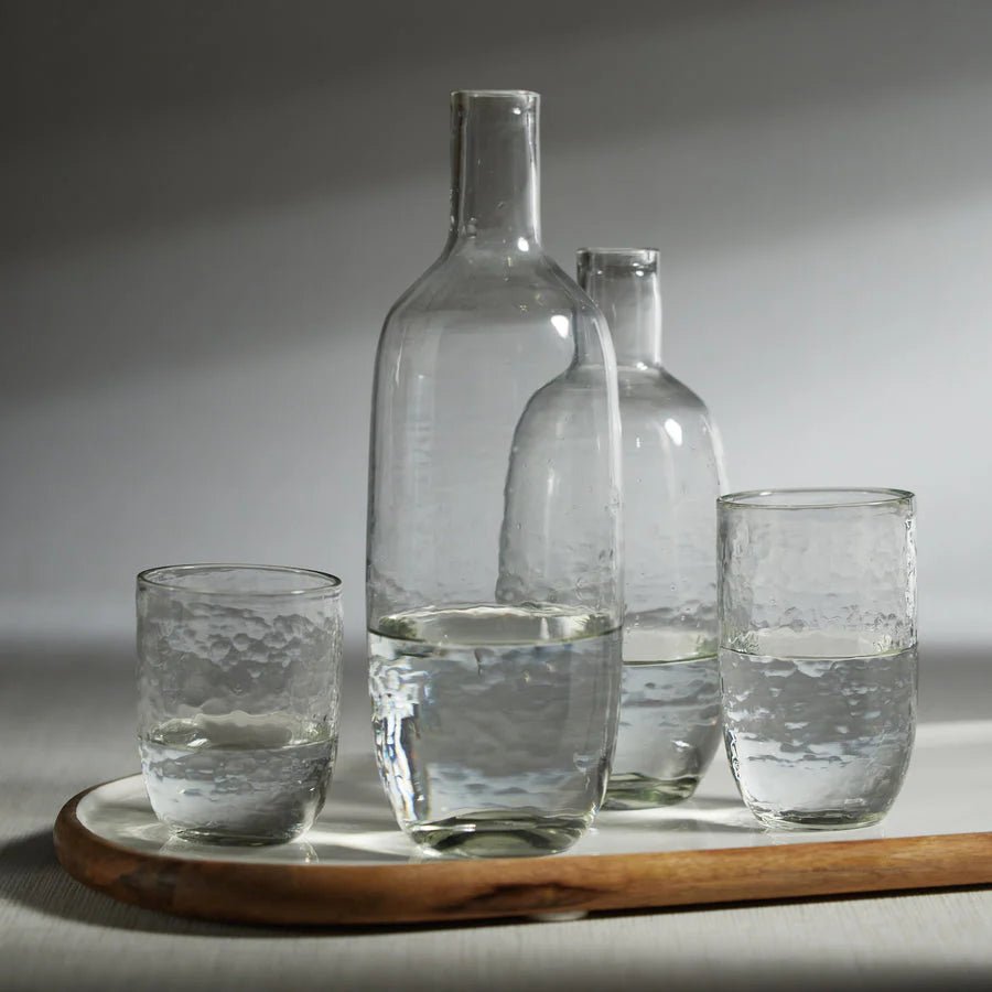 Tabou hammered tumbler styled with cocktail on wooden tray