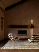 Armadillo Tempest Rug in Tundra, handcrafted undyed new zealand wool rug shown in a room setting