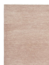 Armadillo Thatch Rug in Pink Salt, corner close-up of the wool pile and edge
