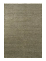 Armadillo Thatch Rug in Marsh, overhead view of the hand-knotted wool weave and edge finish